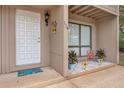 A close up of the entrance to a townhouse with an inviting welcome mat at 752 Howland Ln # 114, Altamonte Springs, FL 32701