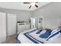 Comfortable bedroom with a ceiling fan, closet, and ensuite bathroom access at 752 Howland Ln # 114, Altamonte Springs, FL 32701