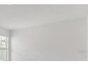 Bright, airy room with fresh paint and a large window at 2524 Raghav Trl, Tavares, FL 32778