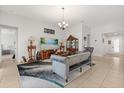 Cozy living room features neutral tones, a plush sofa, and elegant decor at 3847 Shoreside Dr, Kissimmee, FL 34746