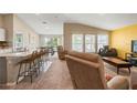 Bright, airy living space with modern furnishings and a seamless flow to the kitchen at 4444 Quartz Ct, Lakeland, FL 33811