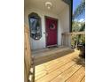 Inviting front door with a decorative wreath and 'HOME' welcome mat at 1292 Nadine Dr, Deltona, FL 32738