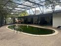 Screened-in pool features an inground pool and spacious patio area at 219 Sheridan Ave, Longwood, FL 32750