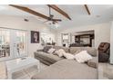 Spacious living room with hardwood floors and modern furnishings at 7011 Archwood Dr, Orlando, FL 32819
