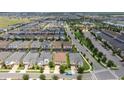 Aerial view showcasing the property's location in a residential neighborhood with easy access to the main road and nearby amenities at 1505 Nassau Point Trl, Kissimmee, FL 34747