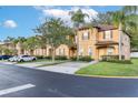 Charming townhomes boasting manicured lawns and private entrances, a perfect residential setting at 412 Verona Ave, Davenport, FL 33897