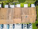 Aerial view of the property with parking, showing roof, green space and neighborhood layout at 1312 Azalea Way, Winter Garden, FL 34787