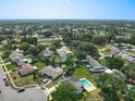 Neighborhood aerial view showing houses nestled among mature trees in a residential area at 217 Melissa Ct, Sanford, FL 32773
