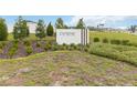 Cyrene at Minneola sign surrounded by manicured landscaping at 1793 Archer Dr, Minneola, FL 34715