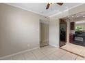 Dining area with tile flooring, access to kitchen and outdoor view from sliding doors at 7449 Daniel Webster Dr # 3, Winter Park, FL 32792