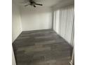 This room features hardwood floors, neutral paint, lots of natural light and is move in ready at 5930 Village Cir # Ge, Orlando, FL 32822
