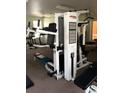 View of the gym shows weight machines, exercise equipment, and an open floor plan at 13512 Turtle Marsh Loop # 729, Orlando, FL 32837