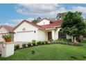 Inviting home boasting a well-kept lawn and appealing curb appeal at 1364 Augusta National Blvd, Winter Springs, FL 32708