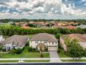 Beautiful home with a manicured lawn in a quiet, well-maintained neighborhood at 1597 Katie Cv, Sanford, FL 32771