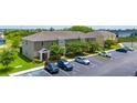 Attractive townhomes offer convenient parking and well-maintained landscaping at 130 Claire Ln, Davenport, FL 33837