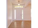 Inviting entryway with tile flooring, and lots of natural light at 3904 Coastal Breeze Dr, Kissimmee, FL 34744