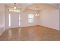 Bright and airy living room with neutral colors, tile flooring, and lots of natural light at 3904 Coastal Breeze Dr, Kissimmee, FL 34744