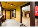 Outdoor balcony leading to a bright condo interior with a ceiling fan and tile floors at 420 Forestway Cir # 206, Altamonte Springs, FL 32701