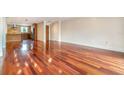 Spacious living room with gleaming hardwood floors and an open layout at 4300 Lake Underhill Rd # D, Orlando, FL 32803