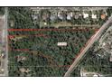 A closer aerial view of the 15 acre property, showing the surroundings and adjacent neighborhoods at 680 Longwood Lake Mary Rd, Lake Mary, FL 32746