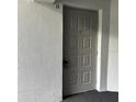 Close up of the building's door with a keypad at 8211 Sun Spring Cir # 11, Orlando, FL 32825