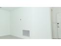 A light and bright flex room, perfect for a home office, play room, or home gym at 471 Wayland Dr, Haines City, FL 33844