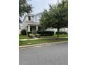 Two story home with a well maintained lawn and beautiful landscaping at 11097 N Folklore St, Winter Garden, FL 34787