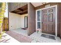 Inviting front porch and doorway with decorative touches and a welcoming ambiance at 2636 Crown Ct, Kissimmee, FL 34741