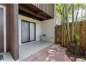 Private outdoor patio featuring tiled flooring, offering a cozy and relaxing space at 2636 Crown Ct, Kissimmee, FL 34741