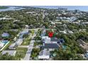 Aerial view showcasing the home's location in a quiet neighborhood near the ocean, restaurants, and local businesses at 507 S Pine St, New Smyrna Beach, FL 32169