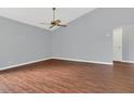 Bright, cozy room featuring hardwood flooring and neutral walls at 9833 Tattersall Ave, Orlando, FL 32817