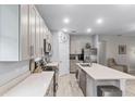 Beautiful kitchen with stainless steel appliances and long counter and cabinets at 1020 Taproot Dr, Winter Springs, FL 32708