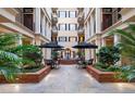 Interior courtyard featuring fountain, lounge seating, and dining area at 140 E Morse Blvd # J, Winter Park, FL 32789
