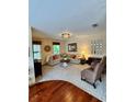 Spacious living room features neutral walls and carpet, creating a cozy atmosphere at 10350 Lake District Ln # S, Orlando, FL 32832