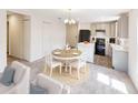 Open-concept living space with dining area and kitchen, perfect for modern living at 198 Oak Lane Loop, Ocala, FL 34472