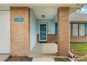 Close-up of the front entrance with brick columns at 2290 Carson Ln, Deltona, FL 32738