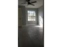 Bright bedroom with large window, neutral walls, tile floors, and ample natural light at 234 Afton Sq # 205, Altamonte Springs, FL 32714