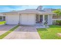 Beautiful home featuring well-manicured lawn, a welcoming entrance, and lovely curb appeal at 4545 Southfield Ave, Orlando, FL 32812