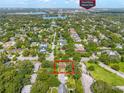 Aerial view showcases the property's proximity to Winter Park in a leafy neighborhood at 1901 Loch Berry Rd, Winter Park, FL 32792