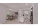 Bright, modern kitchen with white cabinetry, stainless steel appliances, and adjacent dining area at 17445 Sw 25Th Ct, Ocala, FL 34473