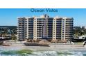 A beachfront building with a beautiful architecture on a sunny day near the beach with ocean waves at 1925 S Atlantic Ave # 411, Daytona Beach, FL 32118