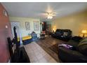 Spacious living room with tile and wood flooring, offering a comfortable layout at 4123 Gander Ave, Orlando, FL 32822