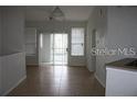 Bright dining room with tile floors and sliding glass doors to the outdoor space at 1101 Vintage Village Ln # 106, Ocoee, FL 34761