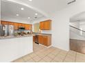 Bright kitchen featuring stainless steel appliances, and ample counter space at 14213 Turning Leaf Dr, Orlando, FL 32828