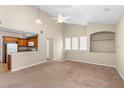 Inviting living room with high ceilings, neutral walls, and plush carpeting at 1101 Vintage Village Ln # 101, Ocoee, FL 34761
