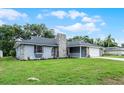 Charming single Gathering home with stone accents and a well-maintained lawn and two car garage at 229 Marcum Trace Dr, Lakeland, FL 33809
