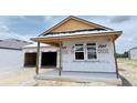 New home with garage and covered entrance under construction at 30124 Misty Pines Road, Mount Dora, FL 32757