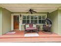 Welcoming front porch with comfortable seating, hanging chair, and decorative touches at 3312 Se 6Th St, Ocala, FL 34471