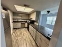 Modern kitchen featuring updated appliances and generous counter space at 9918 Turf Way # 5, Orlando, FL 32837
