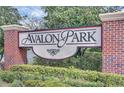 Avalon Park entrance sign with brick columns and lush green landscaping at 14306 Paradise Tree Dr, Orlando, FL 32828